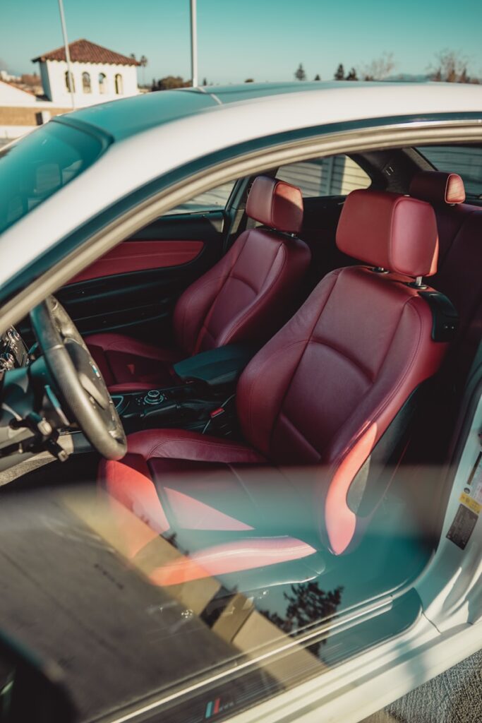 How To Use Car Interior Cleaner To Keep Your Car Interior Spotless (and Well-Maintained) 2 red and black car interior