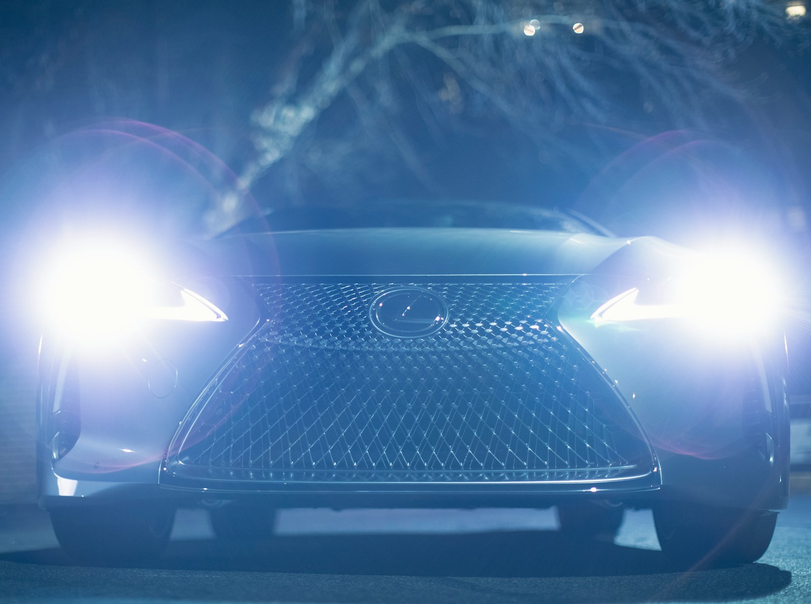 a car that is lit up at night How to Clean Car Headlights for a Crystal-Clear Shine