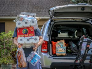 Ultimate Guide to Cleaning and Organizing Your Car Trunk 3 white and blue plastic packs