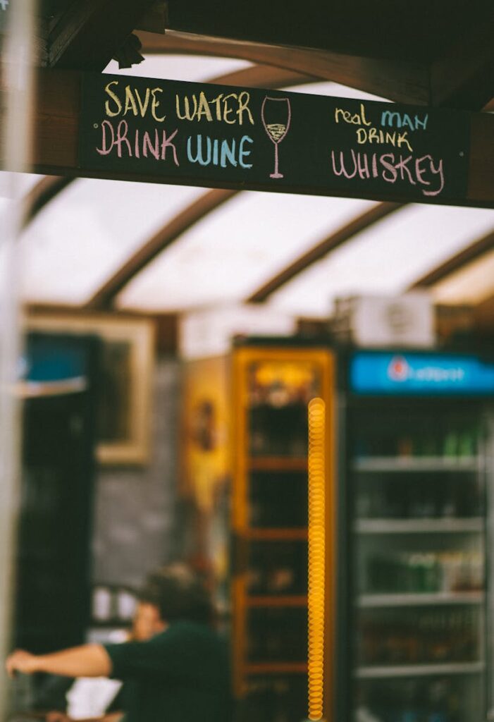 Chalkboard sign in a bar with humorous drink message in Fethiye, Turkey.