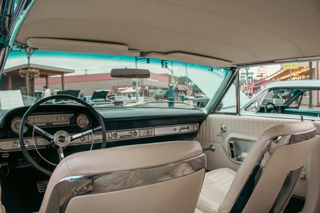 The interior of a car with a steering wheel