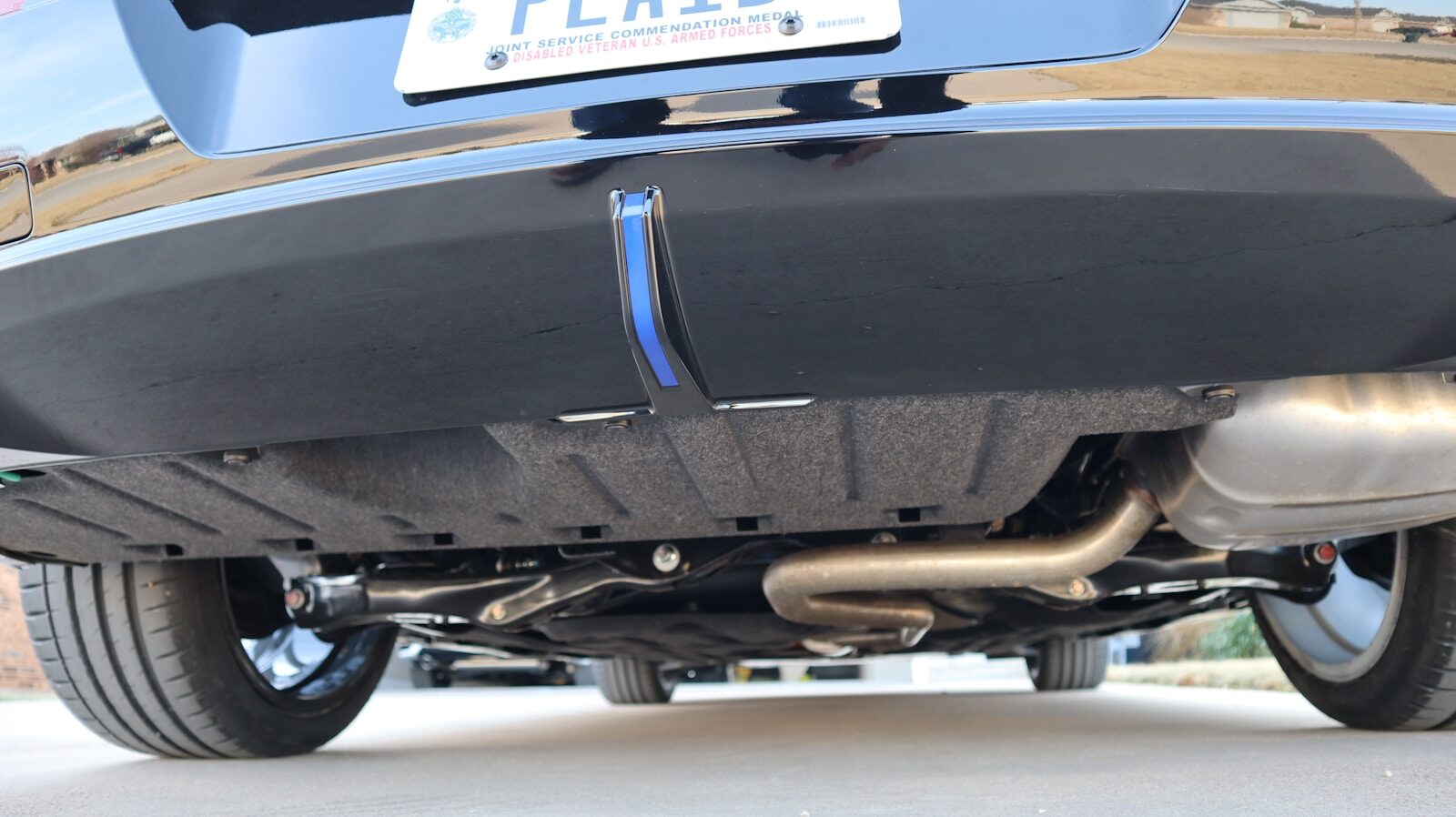 Underside view of a modern car's exhaust system