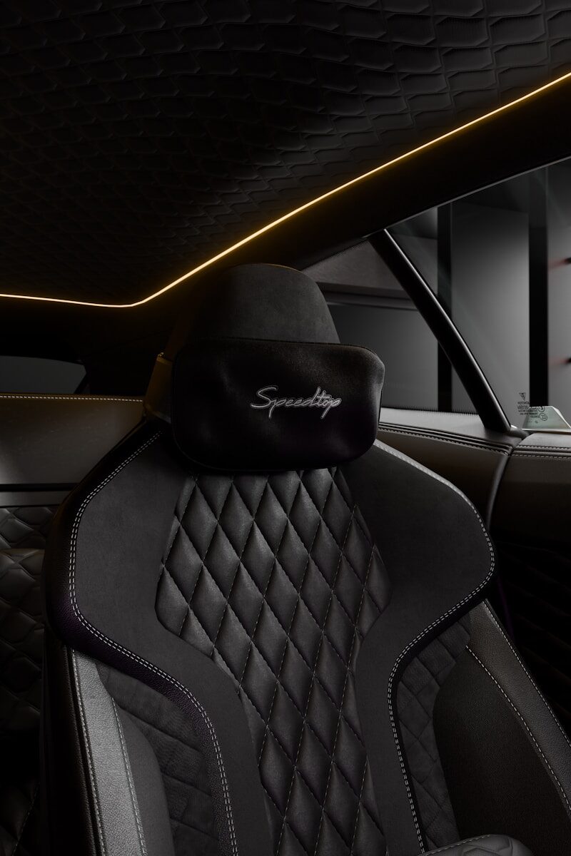 Luxurious car interior with quilted leather seats.