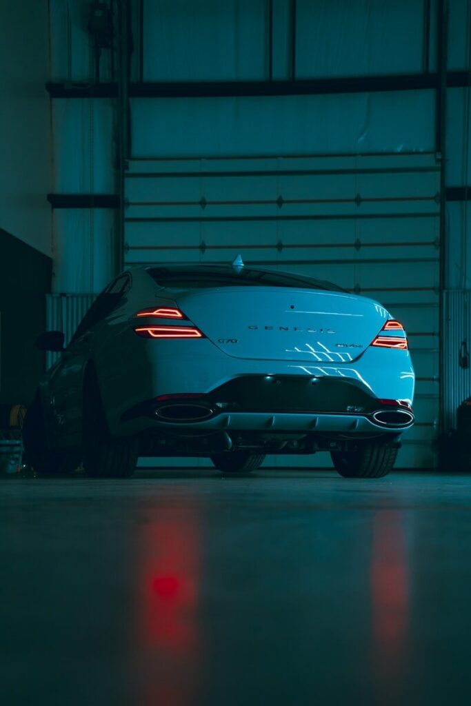 Ceramic Coating Car: Understanding Coatings for Your Car - Protect and Enhance Your Ride 1 a blue sports car parked in a garage