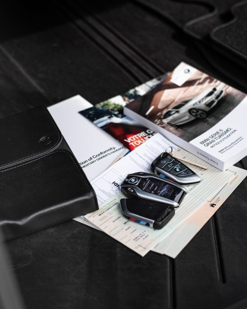 Car Brands Explained: What Matters More Than the Name 3 a couple of cell phones on a table